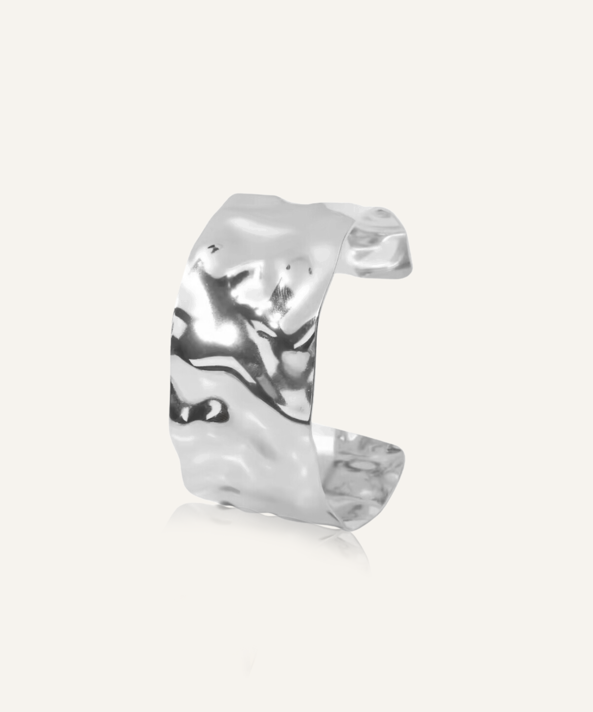 Mara Cuff in silver with molten design shown in flatlay.