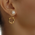 Close-up of Maria Earrings worn, highlighting pearl and gold hoop detail.