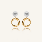 Maria Earrings featuring gold irregular hoops and freshwater pearl drops.