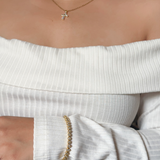 Mira Bracelet worn in an elegant casual look, adding subtle shine to a formal ensemble.