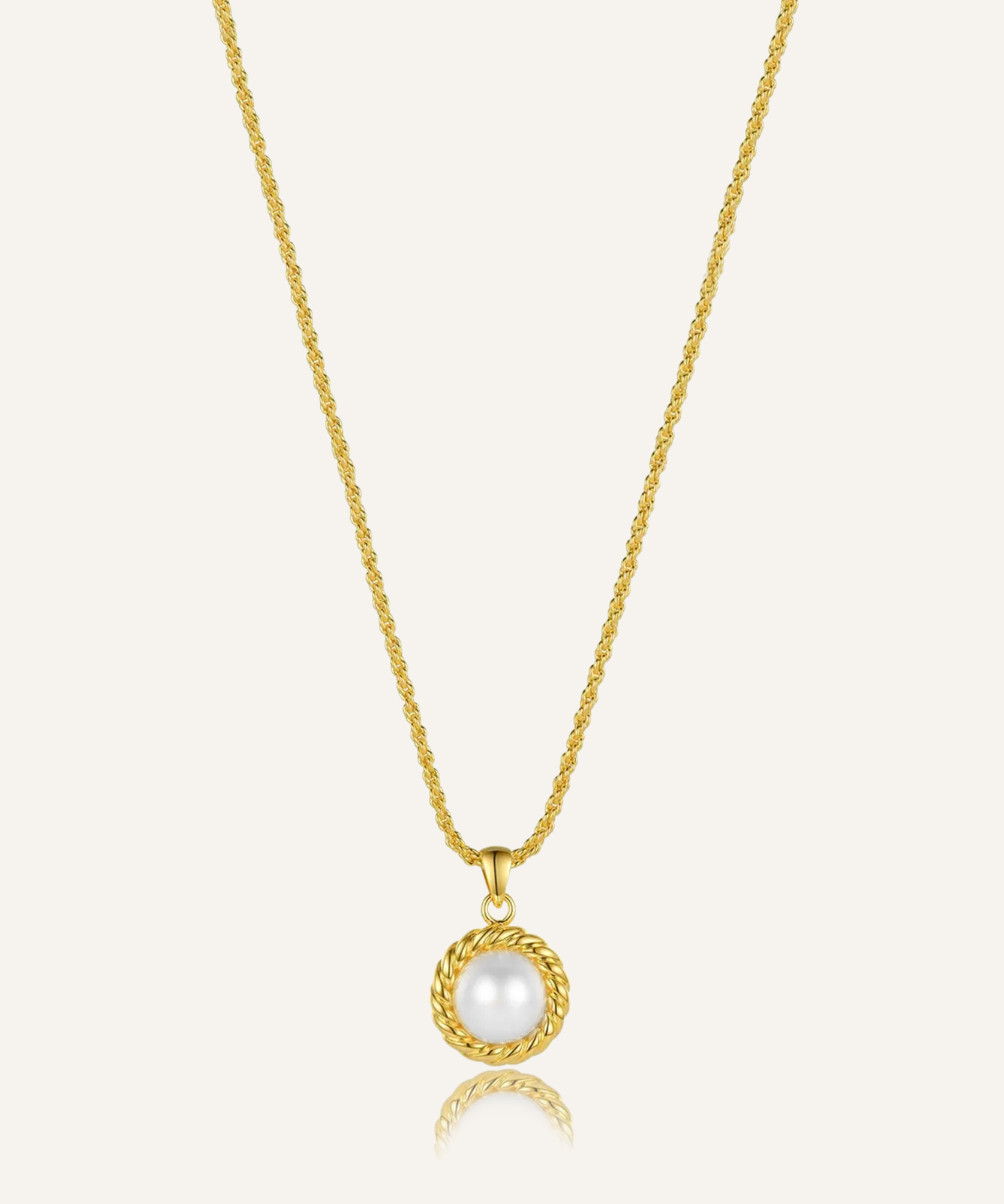 Myrcella Necklace featuring a baroque pearl pendant on an 18k gold-coated chain.
