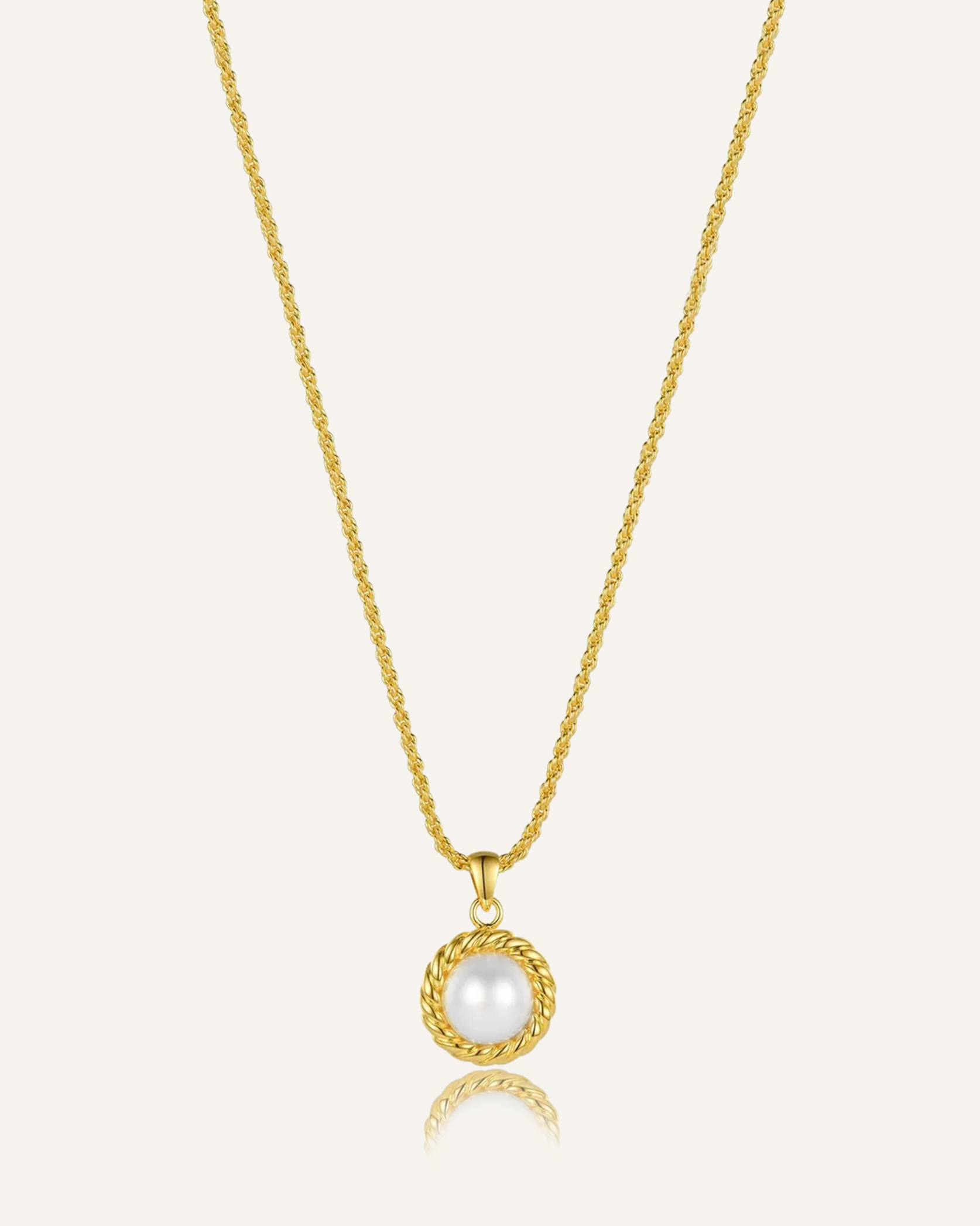 Myrcella Necklace featuring a baroque pearl pendant on an 18k gold-coated chain.