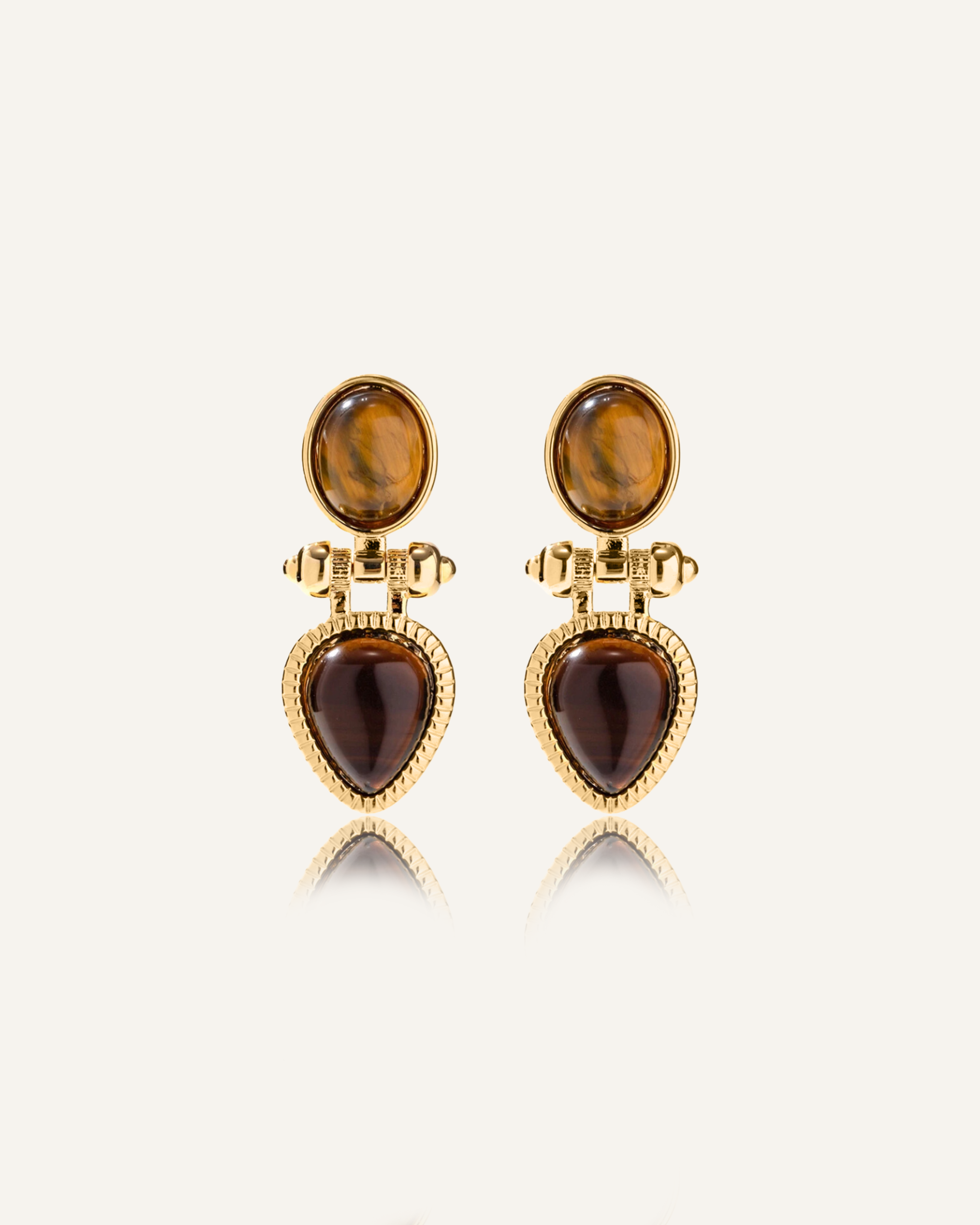 Nadia Earrings with resin stud and tiger eye drop framed in gold.