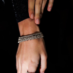 Model wearing the Naomi Bracelet in silver, highlighting the shimmering zirconia stones.