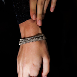 Model wearing the Naomi Bracelet in silver, highlighting the shimmering zirconia stones.