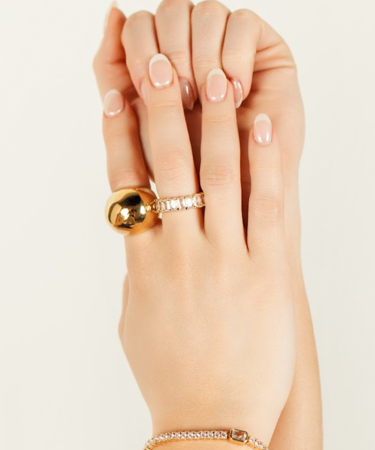 Close-up of model wearing the Ophelia Ring in gold showing dome detail.