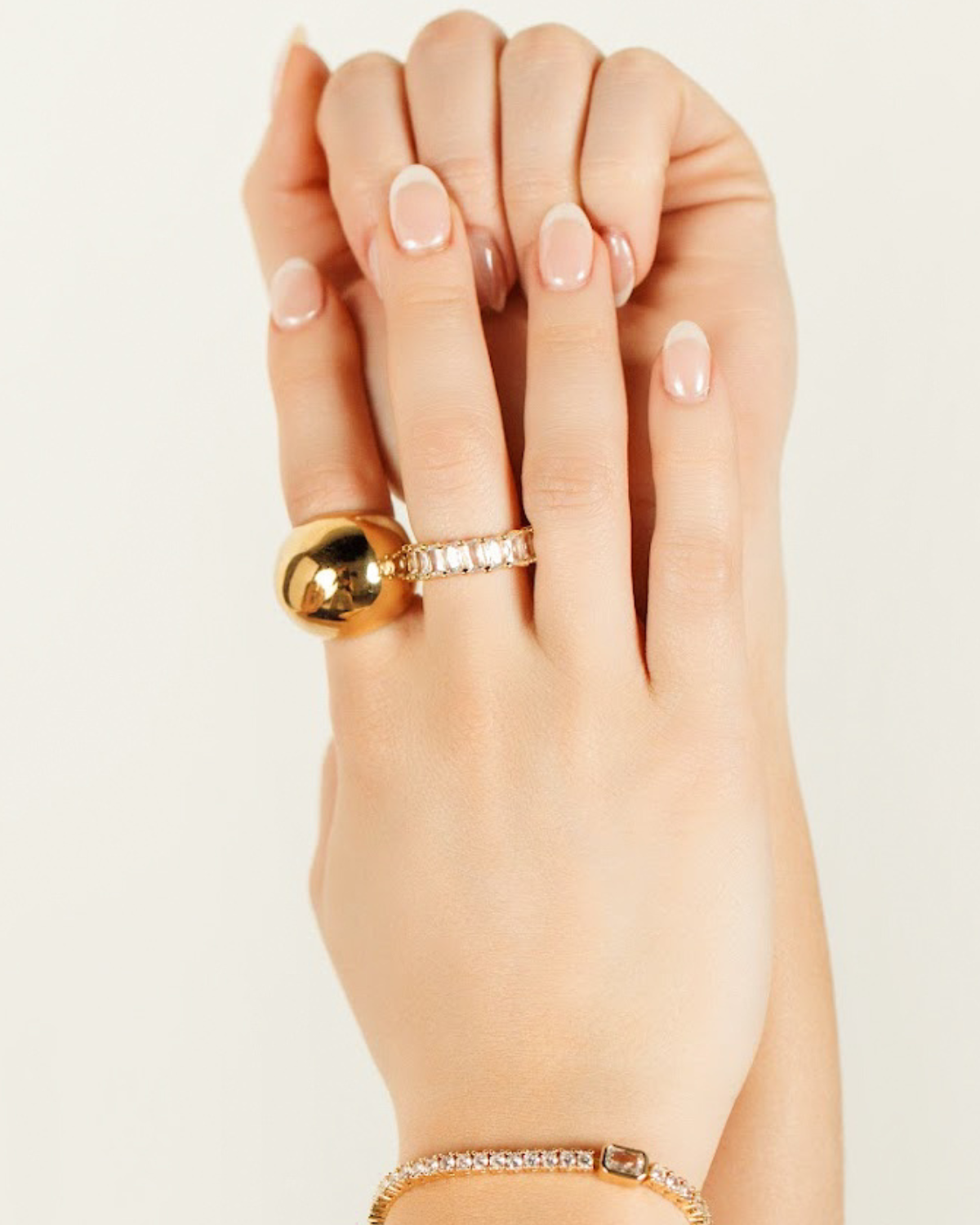 Close-up of model wearing the Ophelia Ring in gold showing dome detail.