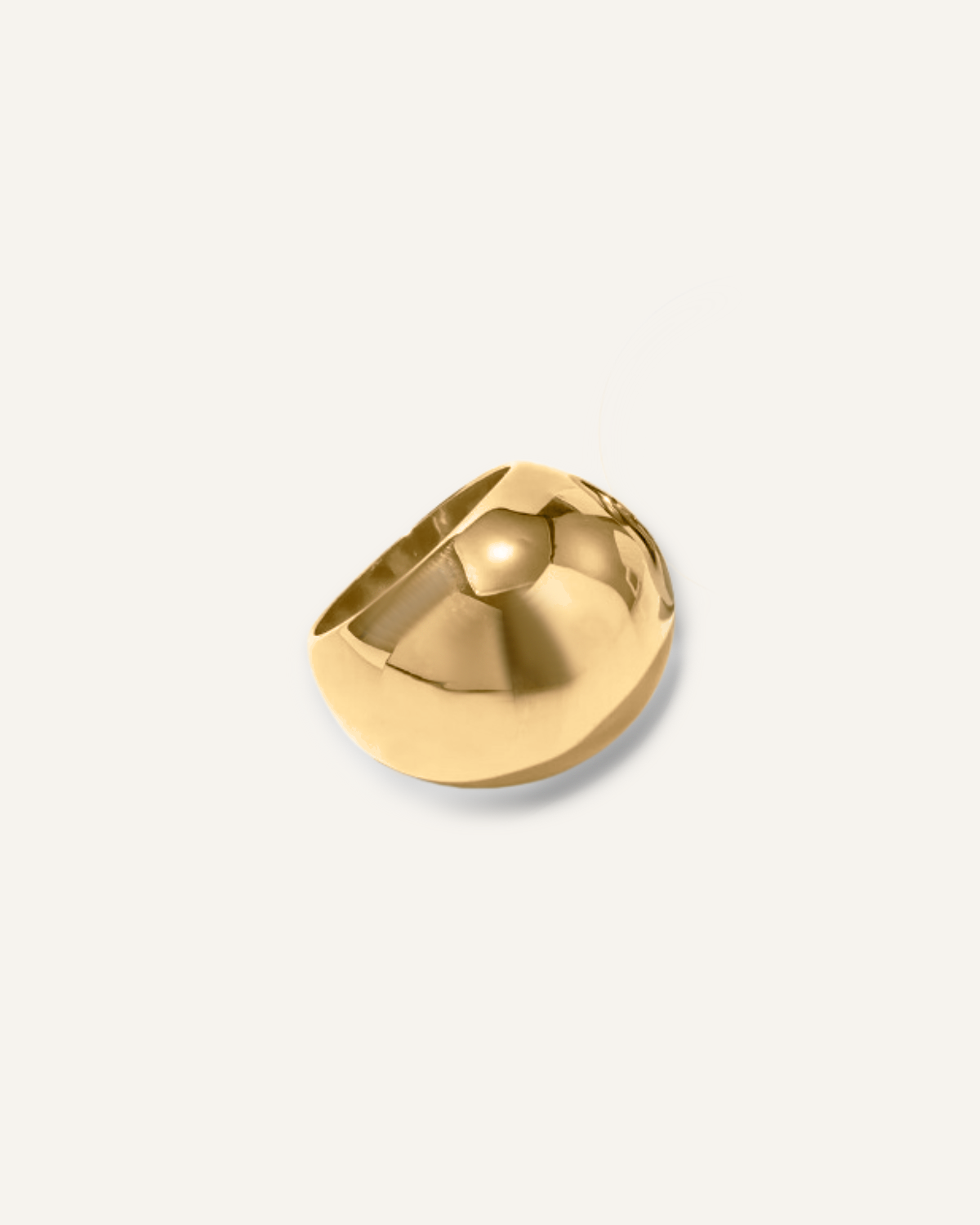 Flatlay of Ophelia Ring in 18k gold finish with bold dome silhouette.