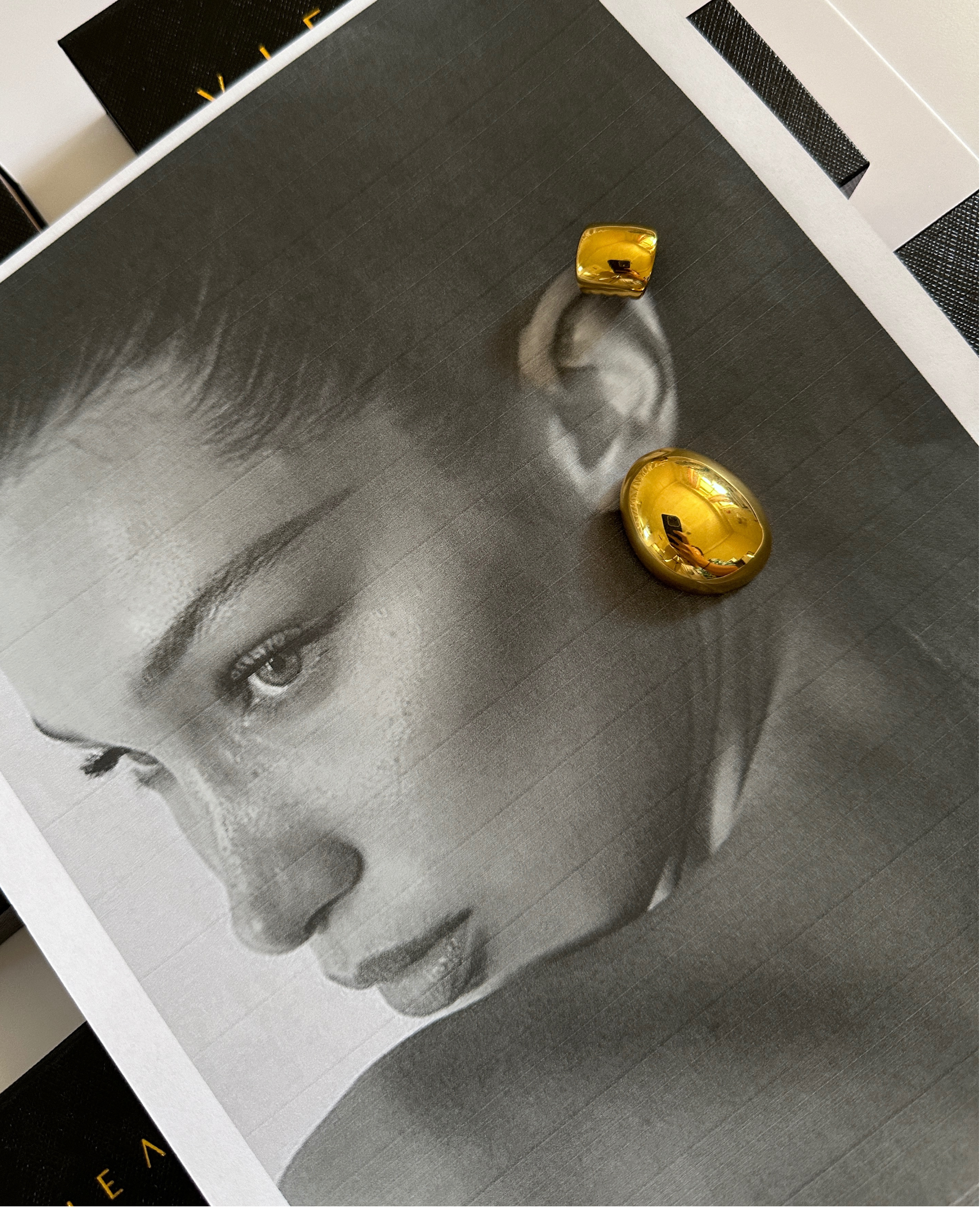 Model showcasing Tala Gold Ear Cuff worn on cartilage for an edgy, no-pierce look.