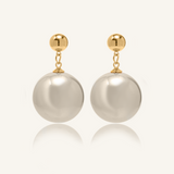 Zaila Earrings with bold 40mm faux pearl drop and gold-coated finish.