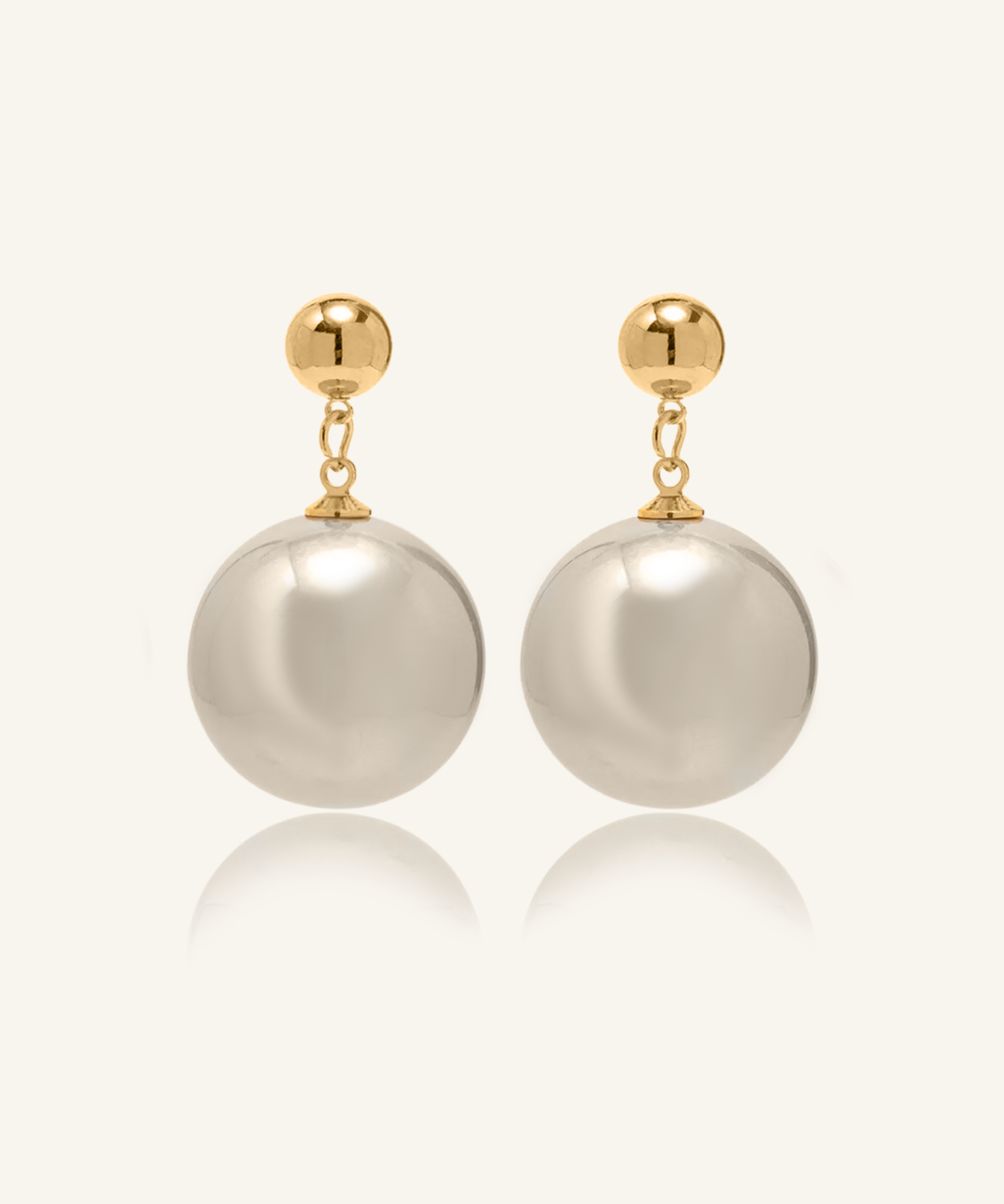 Zaila Earrings with bold 40mm faux pearl drop and gold-coated finish.