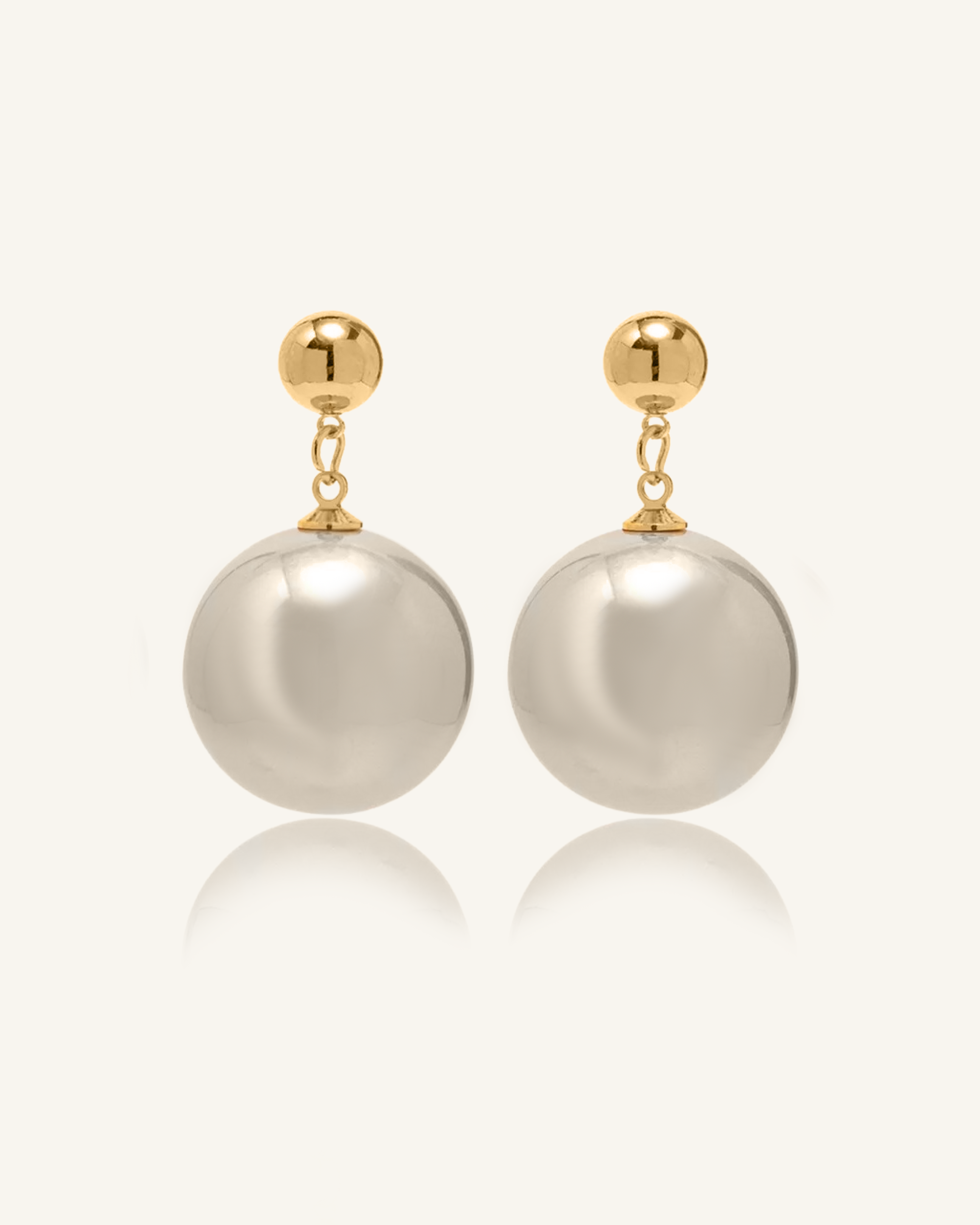 Zaila Earrings with bold 40mm faux pearl drop and gold-coated finish.