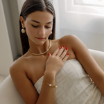 Model wearing Zaila Earrings, highlighting bold statement style.