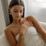 Model wearing Zaila Earrings, highlighting bold statement style.
