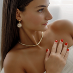 Side profile of Zaila Earrings with visible 1.5" drop length.