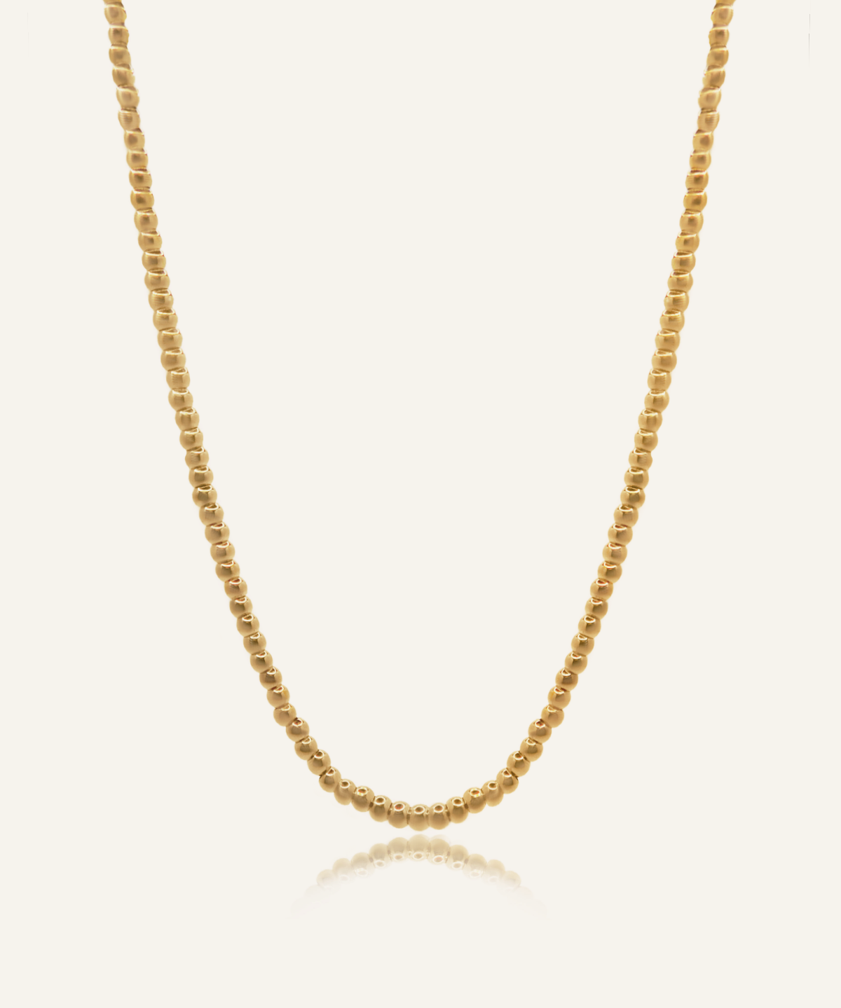 Amelia Necklace featuring a classic 18k gold-coated ball chain with lobster claw clasp.