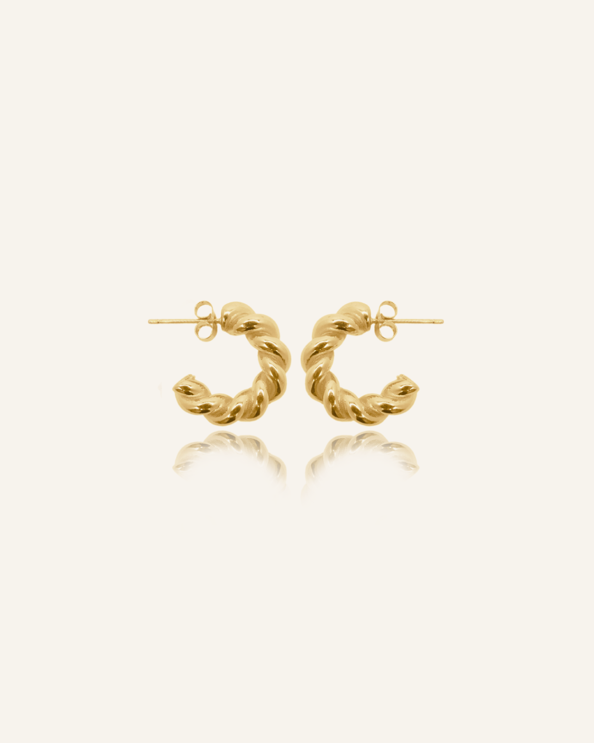 Celeste Earrings with vintage-inspired twisted 18k gold-coated hoops.
