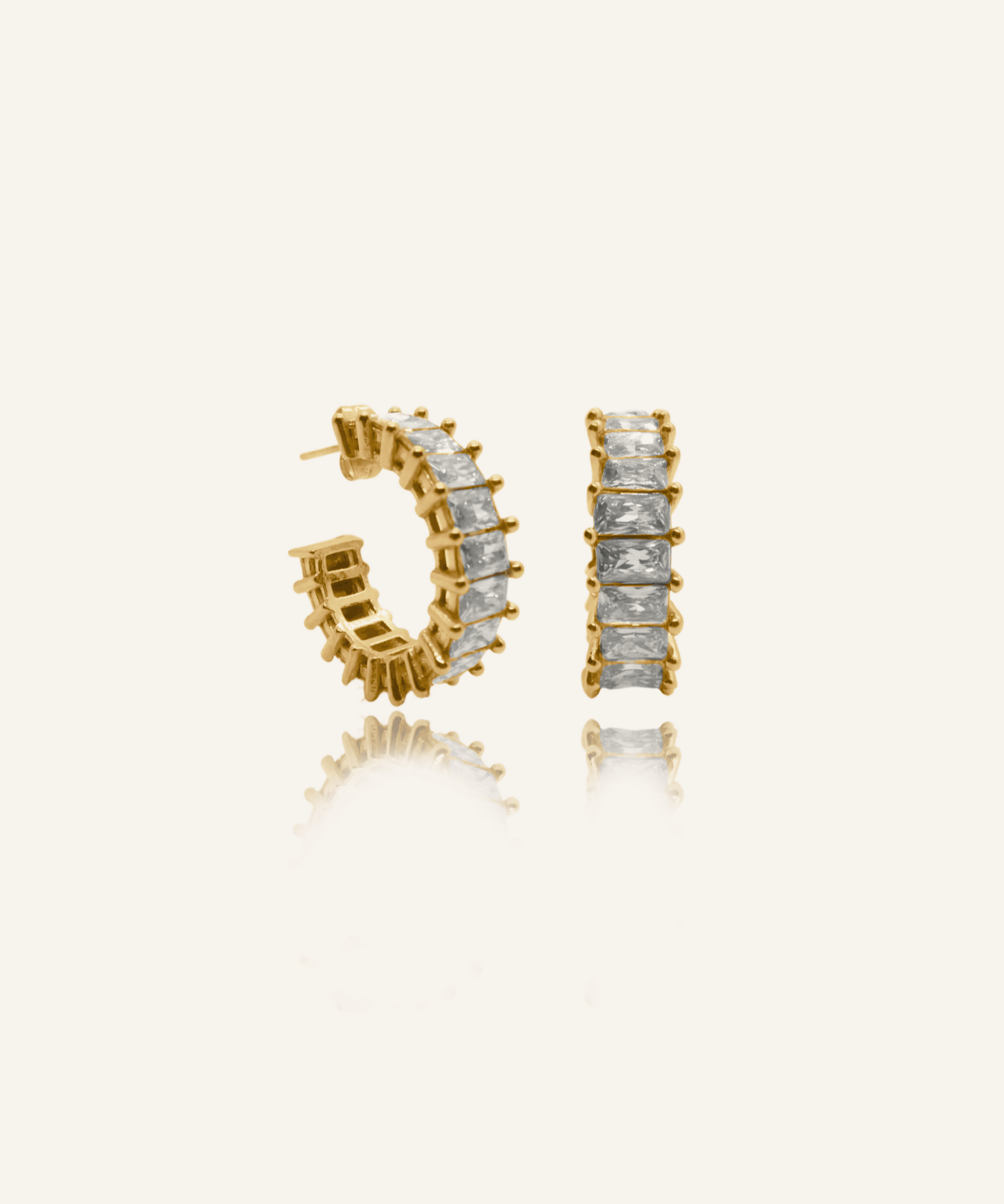 Ciana Earrings featuring rectangular zirconia stones on gold.
