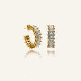 Ciana Earrings featuring rectangular zirconia stones on gold.