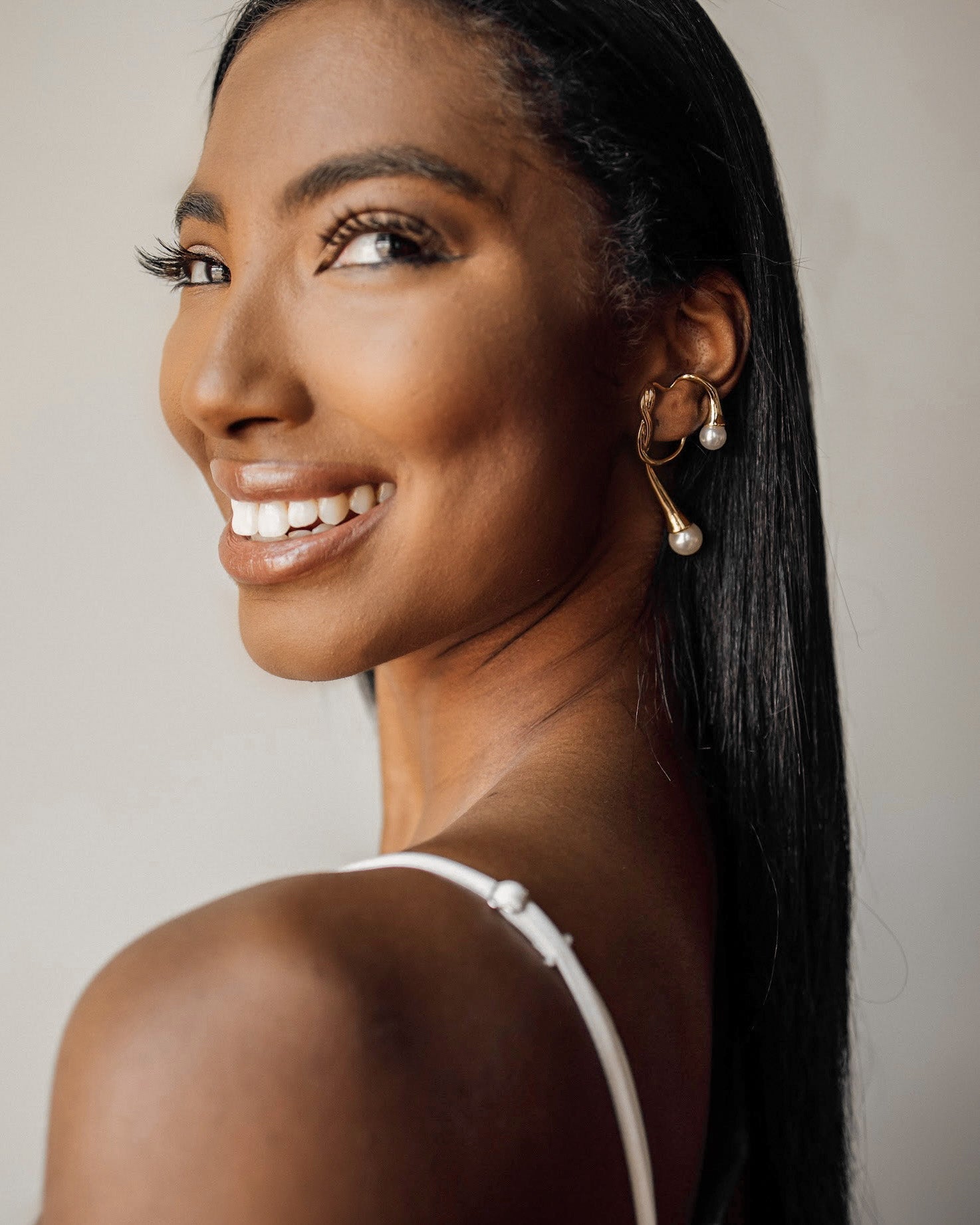 Side angle of Dahlia Ear Cuff worn for an elegant, edgy statement look.