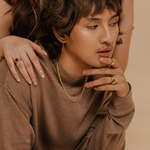 Damian Necklace styled in a portrait shot—perfect minimalist gold accessory for any outfit.