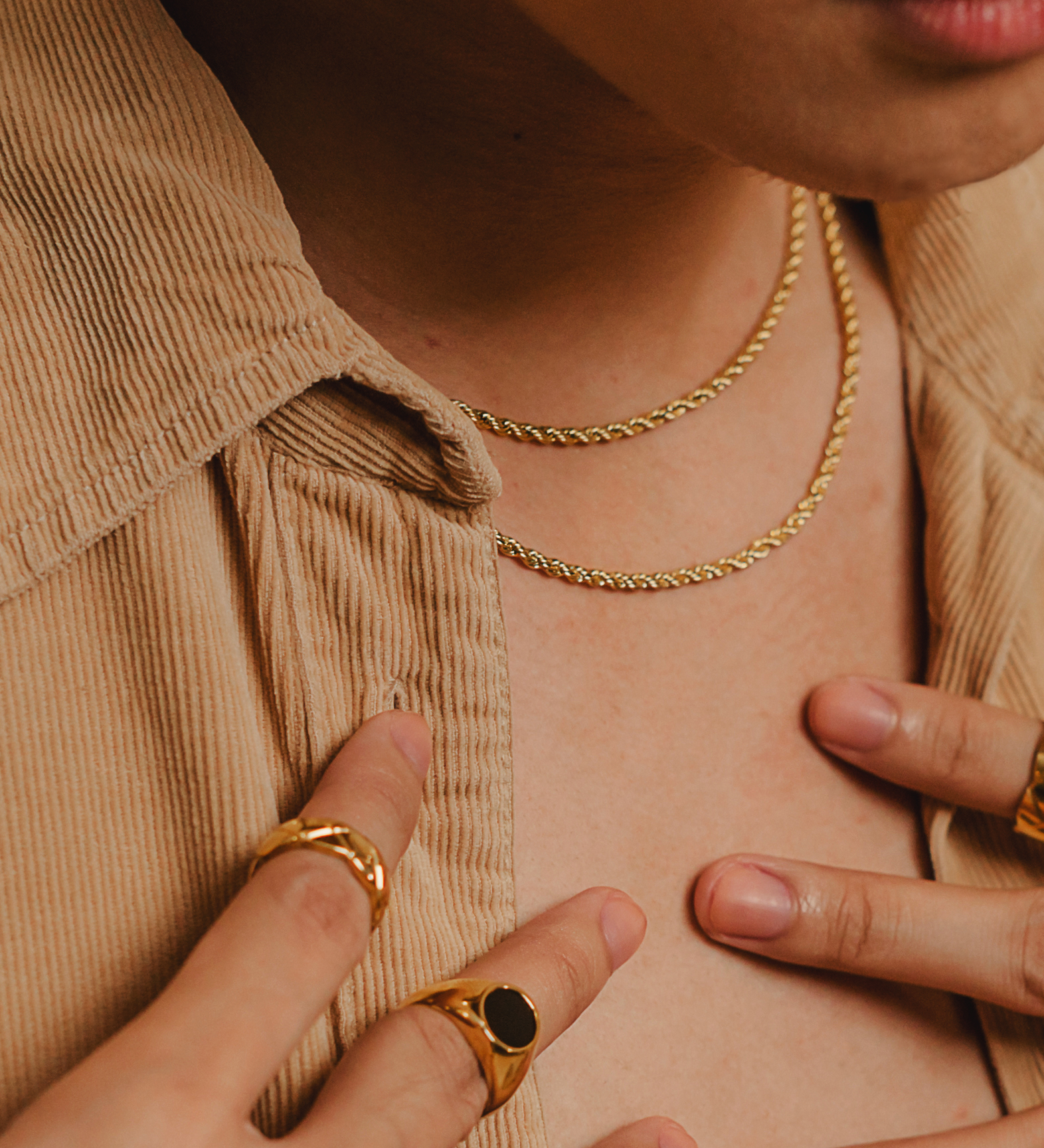 Damian gold rope chain necklace styled in a closeup view—refined and versatile.