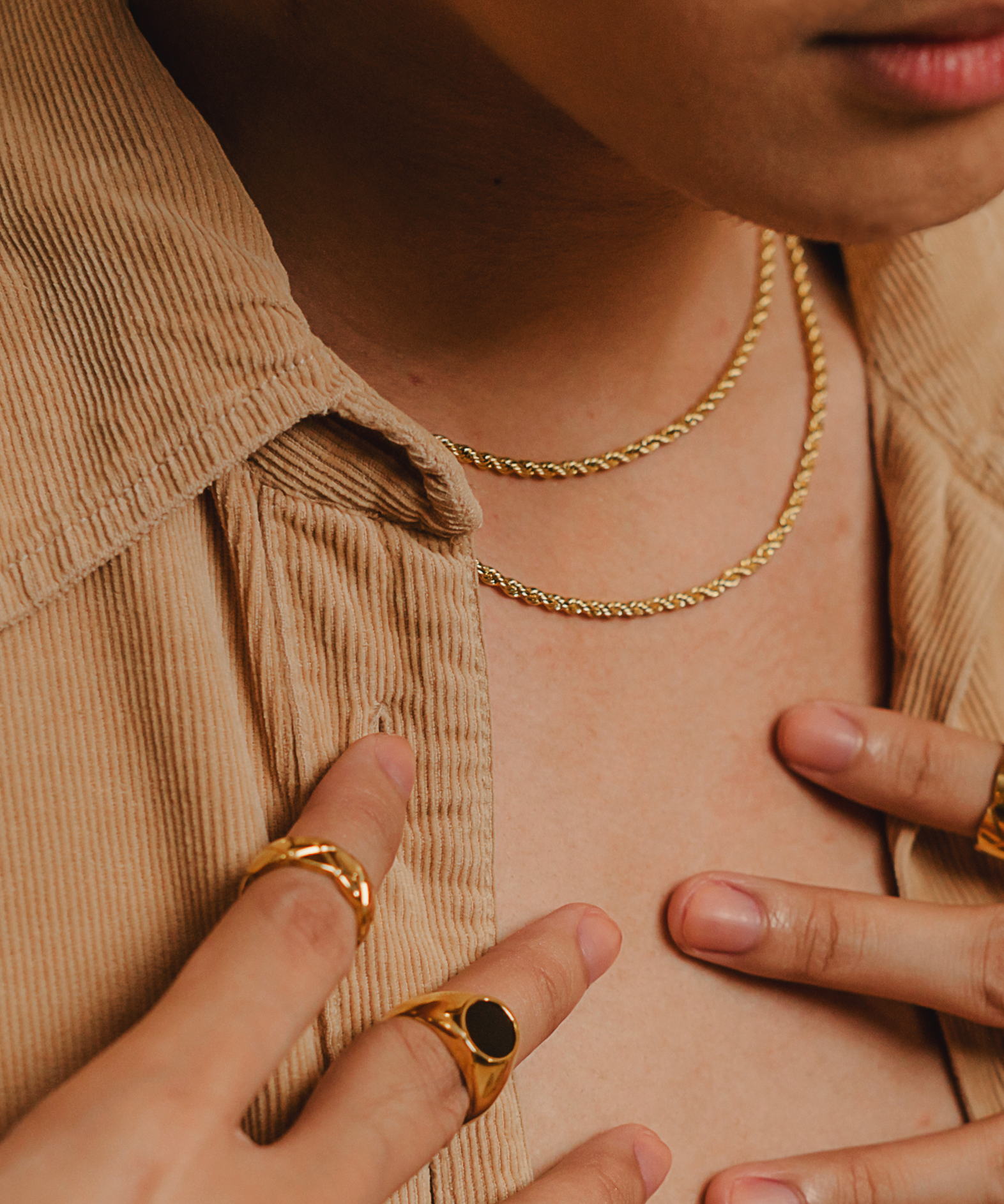 Damian gold rope chain necklace styled in a closeup view—refined and versatile.