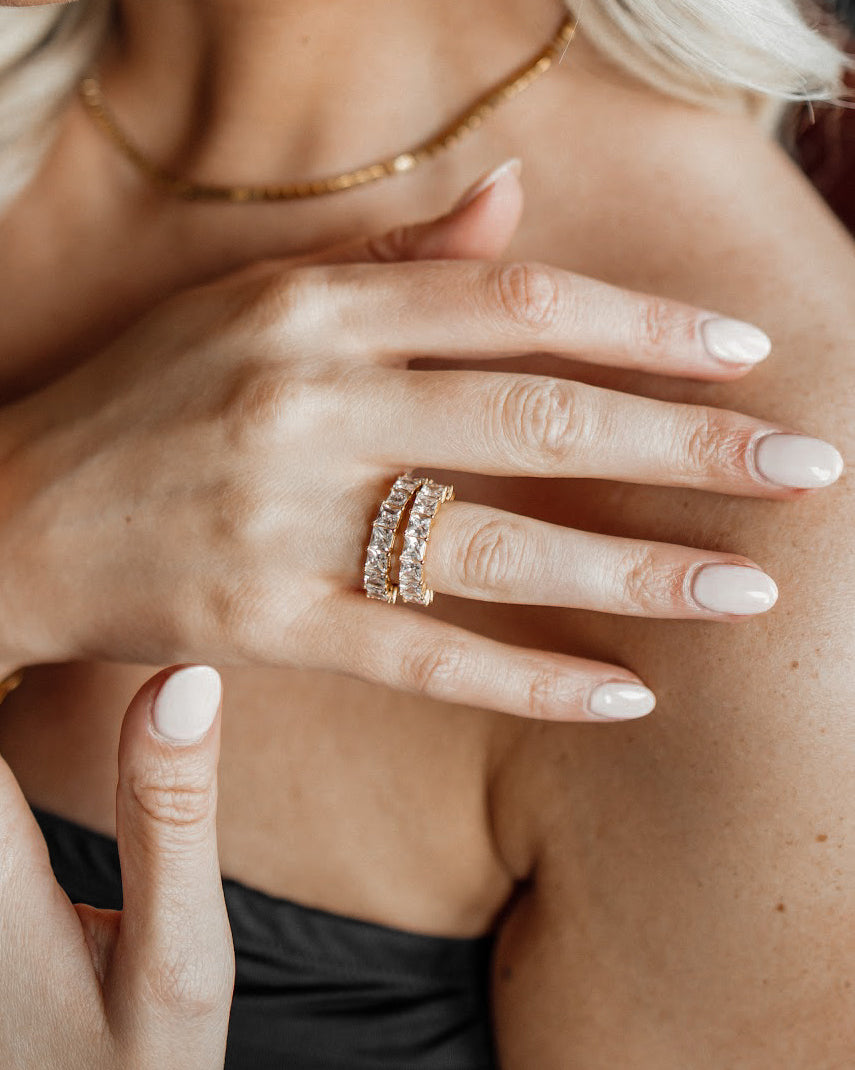 Closeup view of Elia Ring worn on hand, highlighting detailed pave zirconia setting.