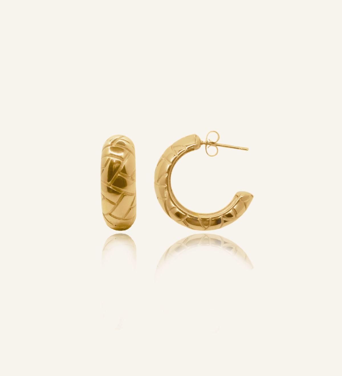 Product flatlay of Gaia Earrings showcasing semi-hoop design with woven texture.
