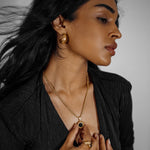 Front view of Gaia Earrings styled for bold yet elegant everyday fashion.