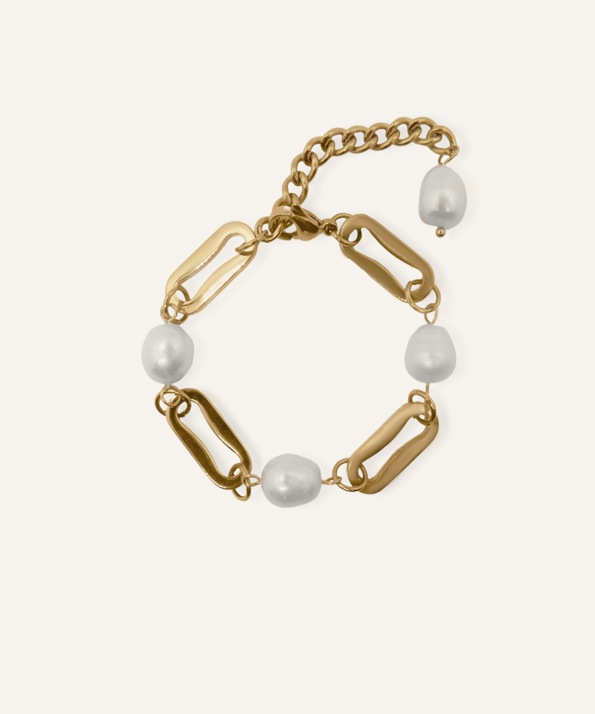 Harriet Bracelet featuring baroque freshwater pearls and gold rectangular chains on a flatlay display.
