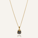 Kamaria Necklace with a bold black onyx pendant on an 18k gold-coated cable chain.
