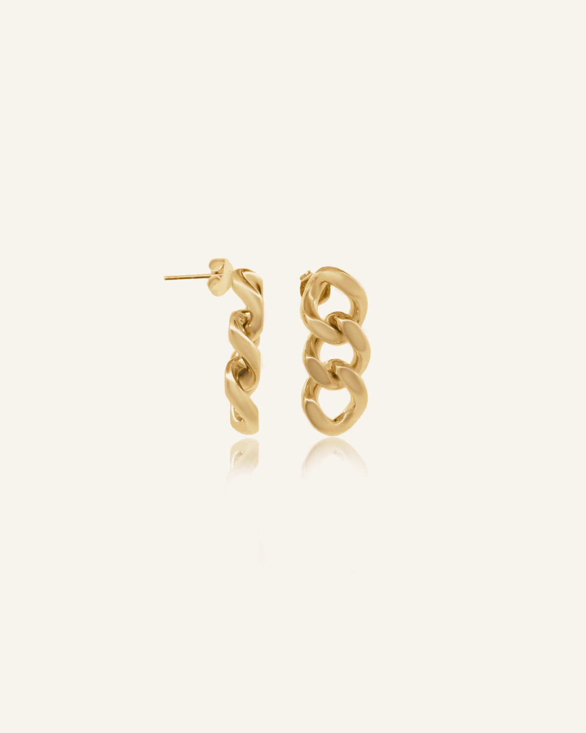 Kyra Earrings featuring 18k gold coated Cuban chain links with push-back closure.