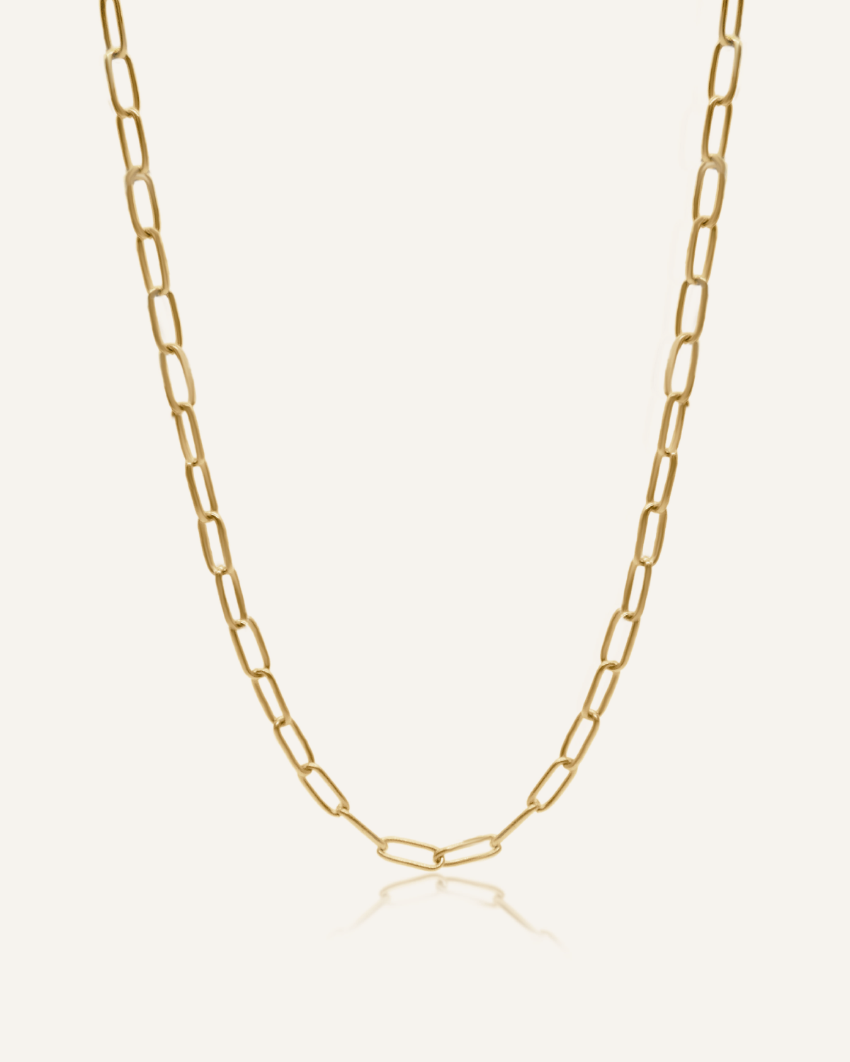 Product shot of the Tawnie Necklace showing its 18K gold-coated paperclip chain design.