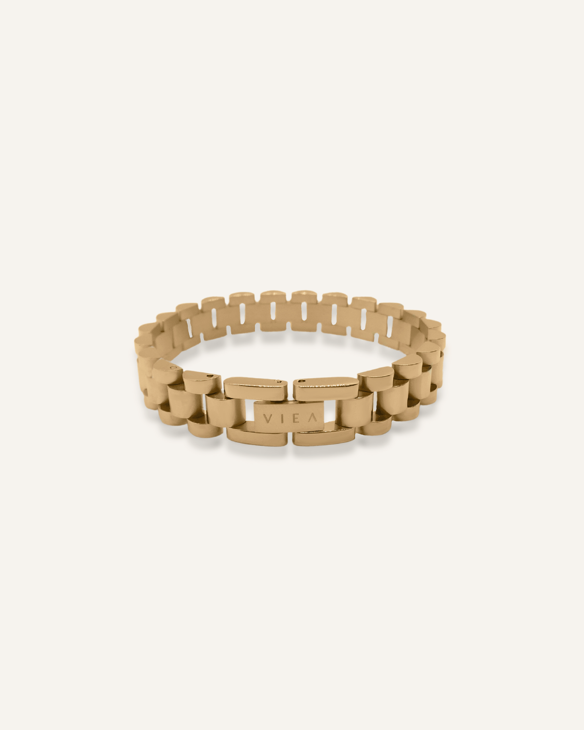 Zain Watchband flatlay showing gold oyster-style links with a polished finish.